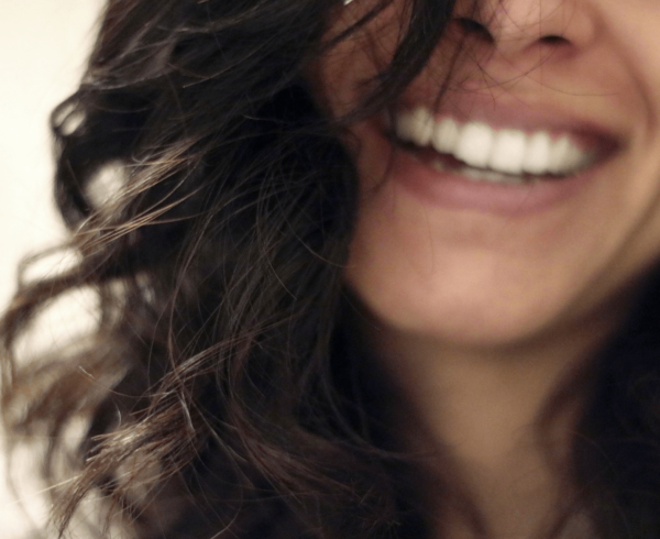 Woman's smile out of focus